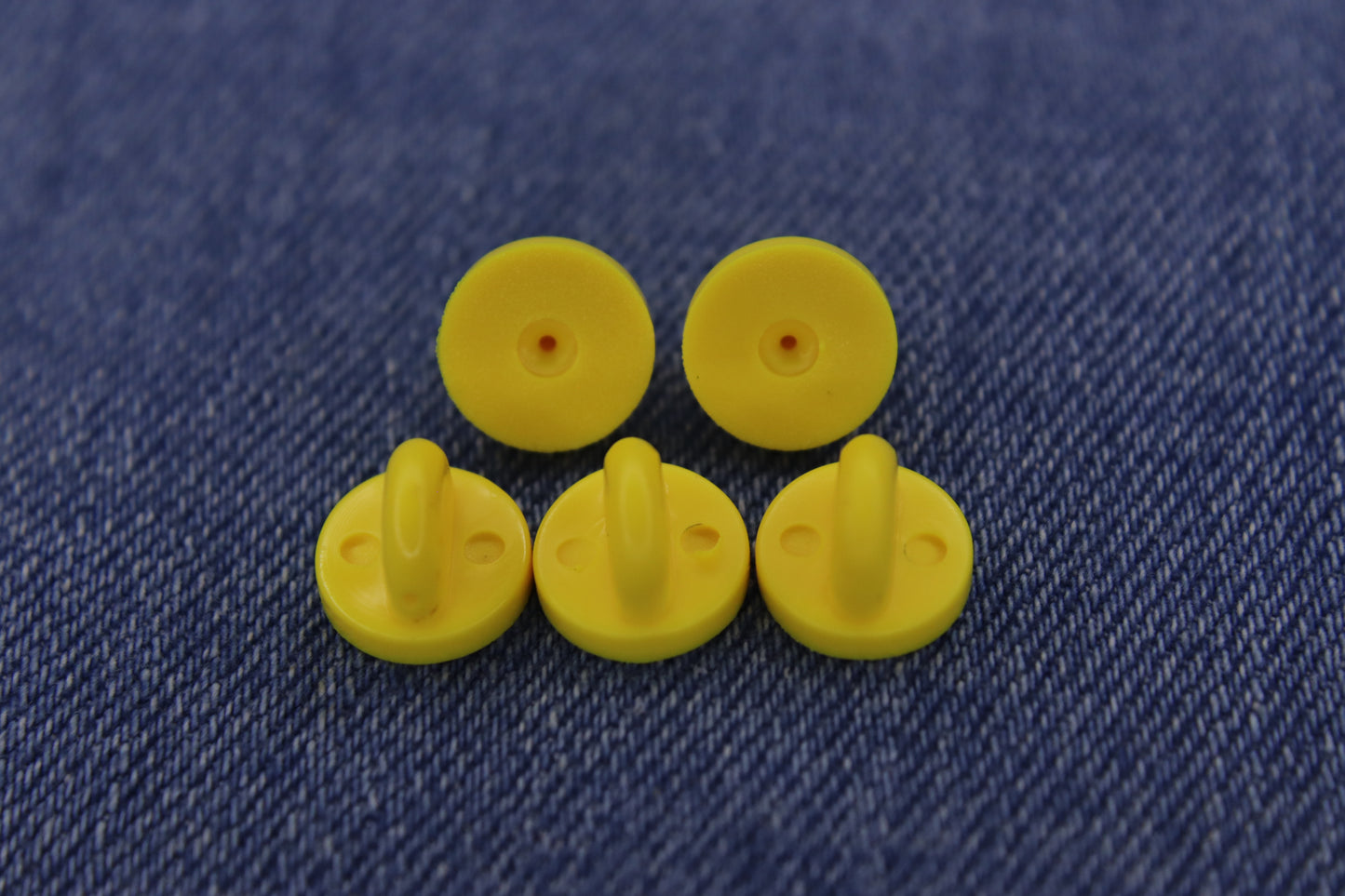 5 Yellow Rubber Pin Backs